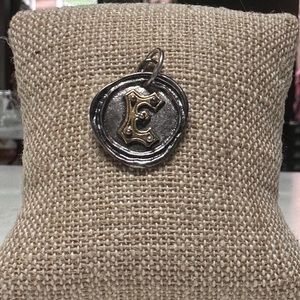 Waxing Poetic Rivet Insignia E